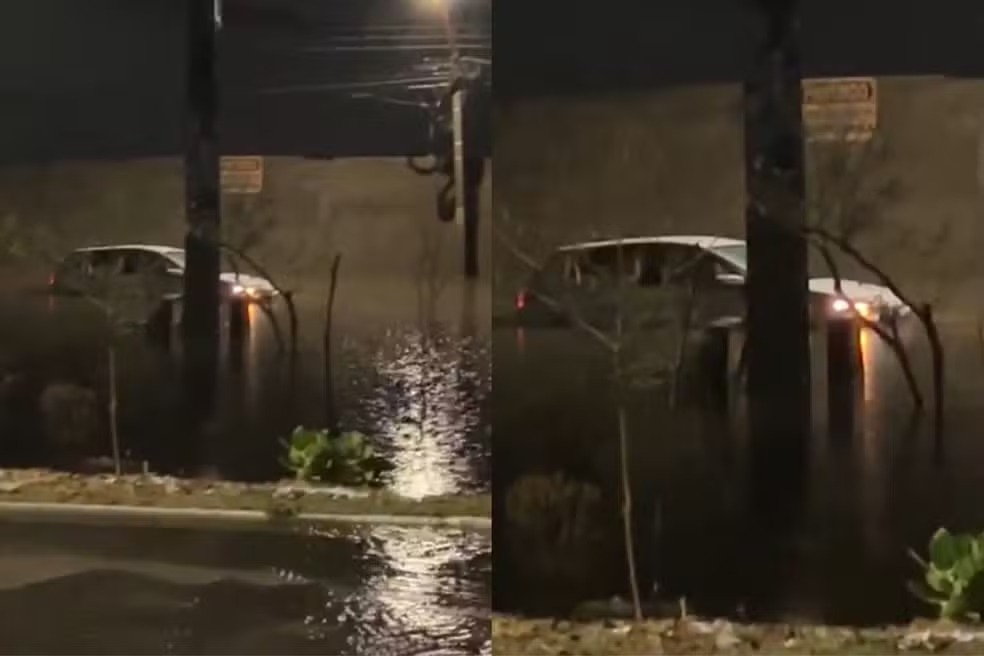 Carro fica ilhado após forte chuva de 86 mm atingir Teresina
